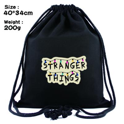 China Stranger anti-theft things print drawstring bag teenager travel bag canvas fashion drawstring pocket anime backpack for sale