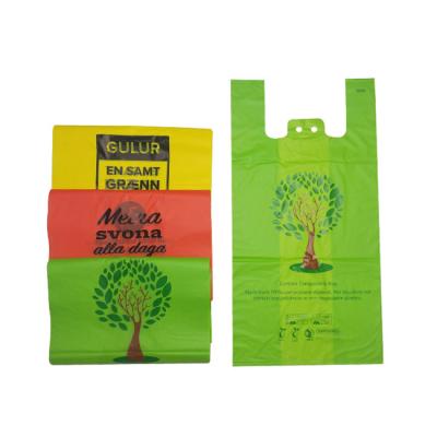 China Blocked Biodegradable T Shirt Bags Packaging Compostable Grocery Bags With Handles for sale