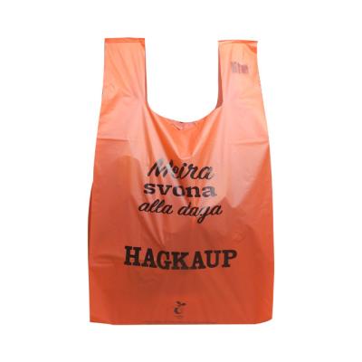 China Biodegradable Reusable T Shirt Bags Easy Tie Handle Singlet Checkout Bags Customized for sale