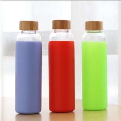 China 2021 Eco Friendly Outdoor Glass Water Bottle High Grade Sustainable Glass Cups BPA Free With Bamboo Lid for sale