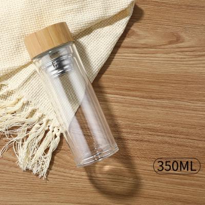 China High Sustainable Borosilicate Double Wall 12 Ounce Glass Water Bottle With Custom Sleeves Glass Tea Bottle for sale