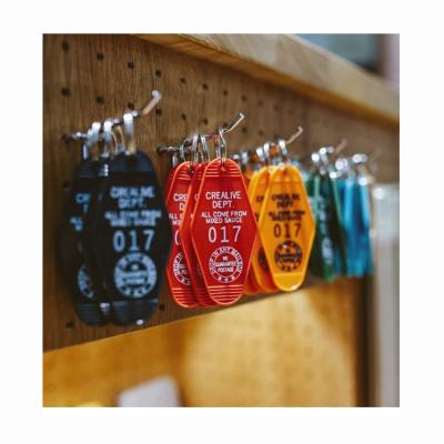 China Hotel Room Waterproof Key Indicator Personalized Print Motel Key Ring Vintage Hotel Key Chain for sale