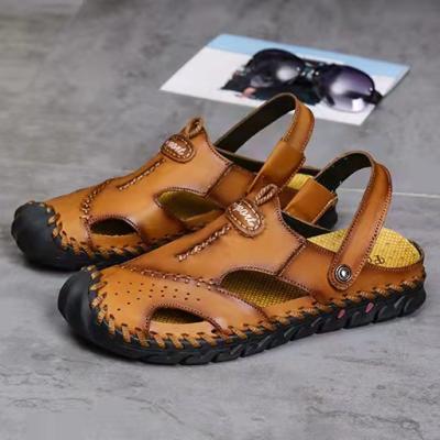 China Flat 2022 new wholesale men's plus size men's beach sandals 35-48 slippers for sale