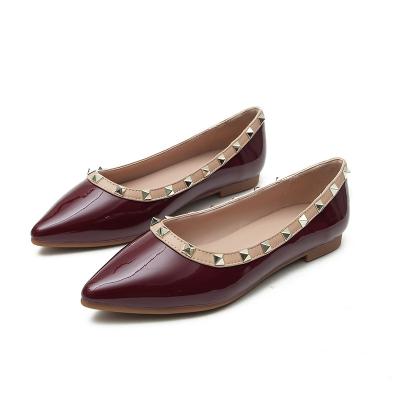 China Massage Women Plus Size Wider Plus Size Flats Shoes Rivet Pointed Toe Elegant Patent Leather Pumps Flats Shoes For Formal Party for sale