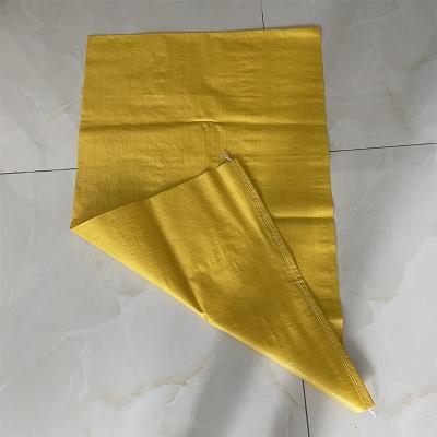 China Moisture Proof PP Woven Bag Yellow Color Packing Animal Feed 25kg / 50kg for sale