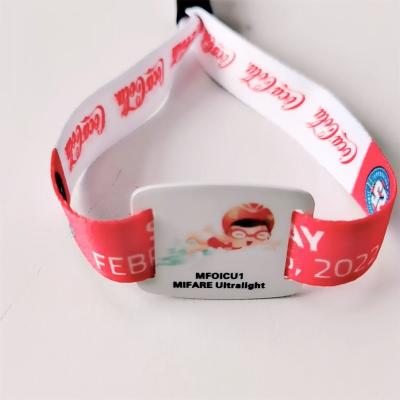 China Waterproof / Weatherproof Silicone wristband with QR codeNFC Silicone Wristband RFID Band Waterproof Closed Round Customize Debossed Logo Printing Bra for sale