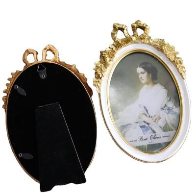 China Classic Popular Women Frame Decors Classic European 6 Inch Resin Photo Frame for sale