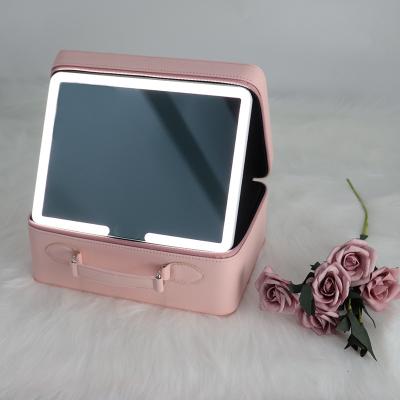 China Portable Mirrored Custom Lighted Jewelry Box LOGO PU Material Makeup Box With LED Light Mirror for sale