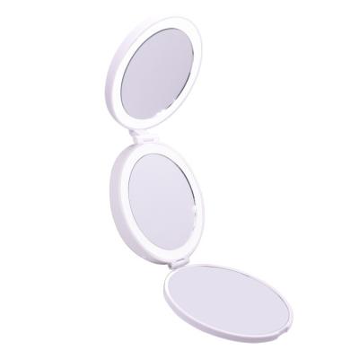 China Wholesale Three-sides Lighted Folding Stand LED Mirror Travel USE Button Battery Travel Makeup Mirror Lighted LED Pocket Mirror for sale