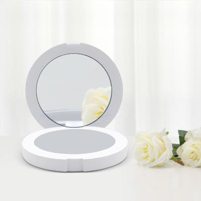 China Portable Vanity Mirror Lighted Compact Beauty Tool Led Lighted Makeup Mirror for sale