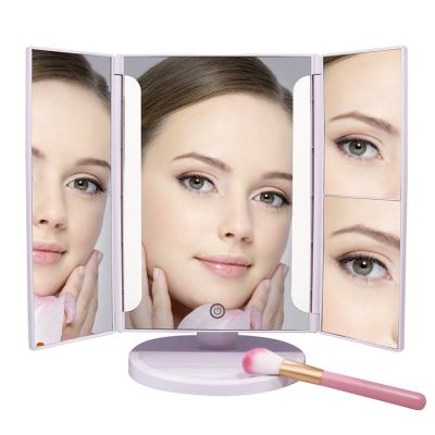 China Custom Lighted Logo LED Vanity Mirror Makeup Desk Lighted Cosmetic Mirror 3 Ways Folding Mirror With USB Charging for sale