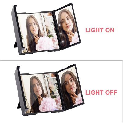 China Shaped Door Led Table Mirror Three Sides 8pcs Led Lights Compact Folding Portable Mirror for sale