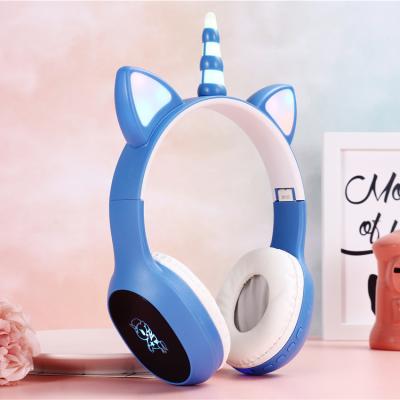 China Earphone Light Up Cartoon Unicorn Headband Wireless Super Bass Stereo Earphone For Kids for sale