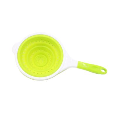 China Sustainable Eco Friendly Green Silicone Folding Kitchen Gadget Perforated Round Shape Strainer Colander With Handle for sale