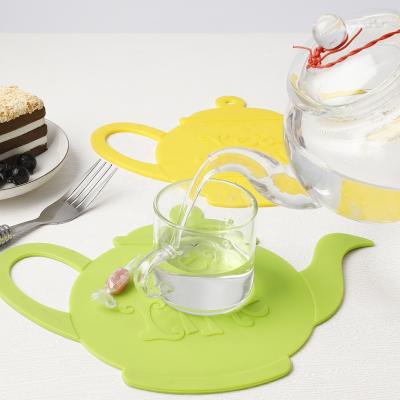 China Sustainable Kitchenware Four Colors Tea Silicon Purple Red Green Yellow Custom Table Mats And Coasters for sale