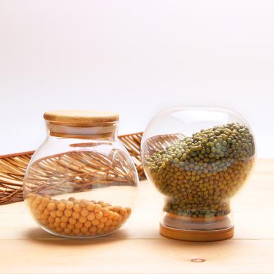 China Sustainable Round Storage Jar Glass Tea Canister Eco - Friendly With Bamboo Lid for sale