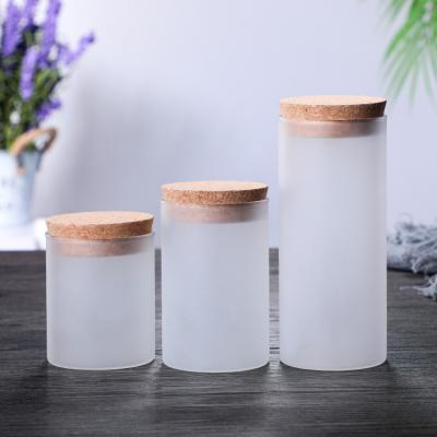 China Wholesale Home Decoration White Matte Frosted Glass Candle Jars With Cork Cover for sale