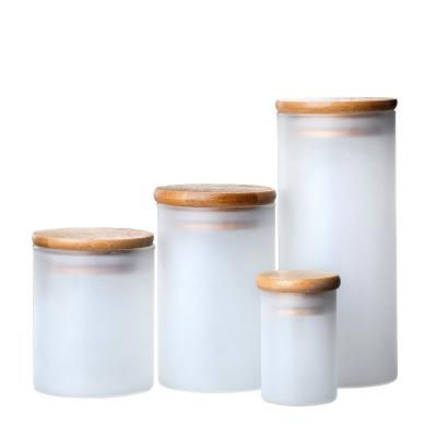 China Home Decoration Tall Borosilicate Candle White Matte Frosted Glass Jar With Lid for sale