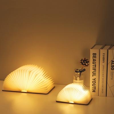 China Creative Folding Book Dormitory LED Rechargeable Book Light Bedroom Lamp USB Night Lamp Paging Grain Modern Retro Small Wood Book Lamp for sale