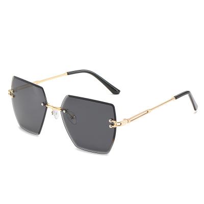 China New Fashion Sunway Eyewear Fashion Metal Sunglasses Women Vintage Rimless Sunglasses for sale