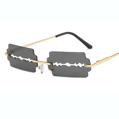 China Fashion Sunglasses Newcomers Shape Metal Sunglasses Personality Rimless Blade Hot Seller Sun Glasses for sale