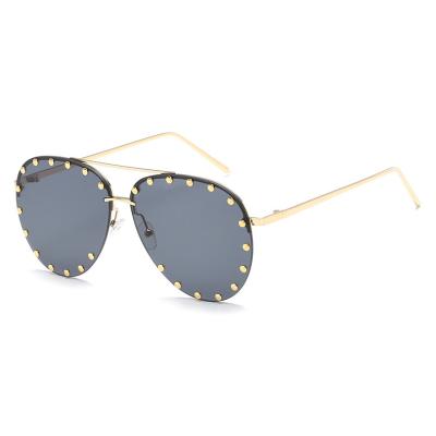 China Fashion sunglasses fashion sunglasses newest rivet metal frame rimless aviation women ladies shades polish sunglass sunglasses for sale