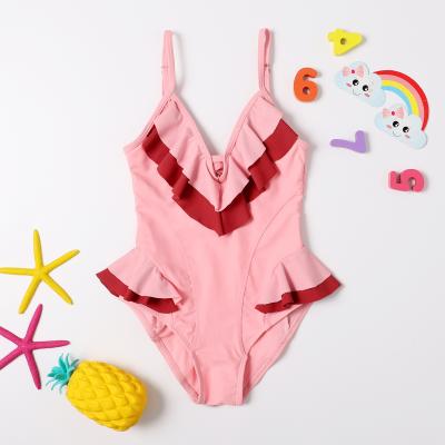 China Anti-UV Hot Selling Ruffled Solid Set One Piece V-Neck Swimwear Kids Swimwear Pleat Strap Swimsuit for sale