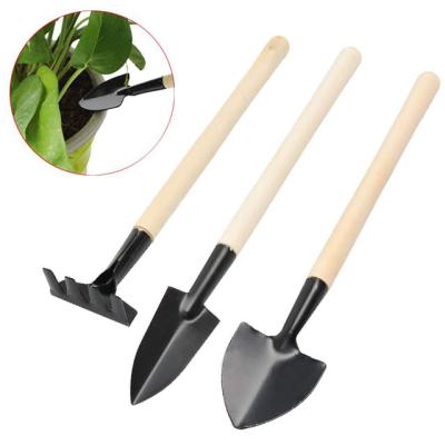 China Durable Wooden Handle Heavy Duty Steel Rake Mini Garden Shovel Camping Tools for sale