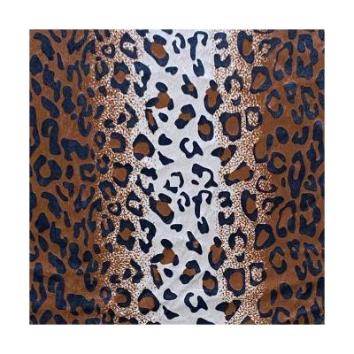 China Long pile high quality durable using various wholesale animal printed plush material fabric for sale