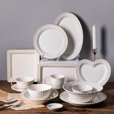 China Viable Nordic White Dinner Dishes Sets Dinnerware Set Dinnerware Set Porcelain Dish High Quality Embossed German Ceramic Modern Teacup for sale