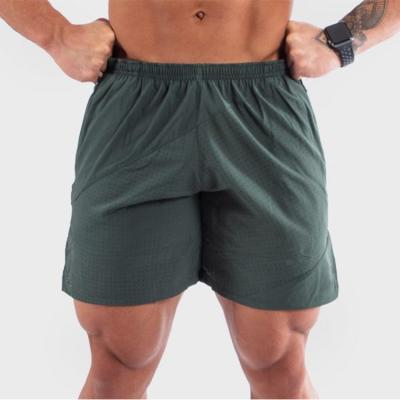 China OEM Sustainable Mens Gym Shorts With Pockets Wholesale Mens Workout Double Shorts Top Sale Mens Sports Shorts for sale