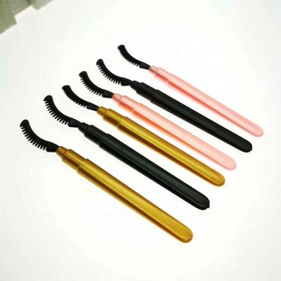 China Angular Blush Low Cost High Quality Black Head Plastic Handle Silicone Eyelash Brush Makeup Brush for sale