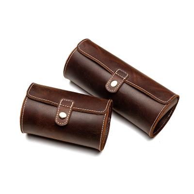 China Handmade Watch Storage Leather Case Organizer Jewelry Travel Bag Round Shape Watch Protector Holder with Closure Strap for sale