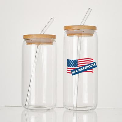 China 16oz Clear Glass Canister USA Warehouse 16 20 Ounce Reusable Customizable Clear Cup Soda Coffee Beer Can Drinking Glasses with Bamboo Lid and Glass Straws for sale