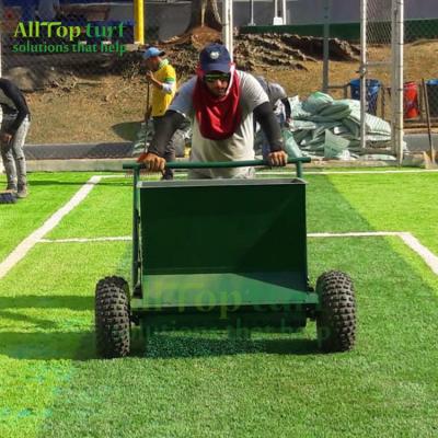 China Small rear wheels for easy direction changing sand and rubber dropper machine for spreading filling (sand and rubber granules) on artificial grass for sale