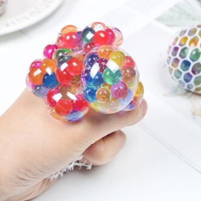 China Creative Funny Extrusion Educational Ball Grape Bead Golden Toy 6.0 Toy Box Children's Toys for sale