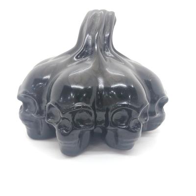 China Jiangsu Wholesale High Quality Hand Carved Halloween Gift Black and Red Crystal Pumpkin Skulls for Souvenir for sale