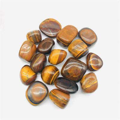 China Wholesale Europe natural quartz crystal gravel yellow tiger eye feng shui tumbled stone Rolling Stone for home decoration for sale