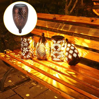 China Christmas Ghost Lamp Solar Powered Vintage Waterproof Romantic Metal LED Ghost Light for Festival Garden Hanging Decoration for sale