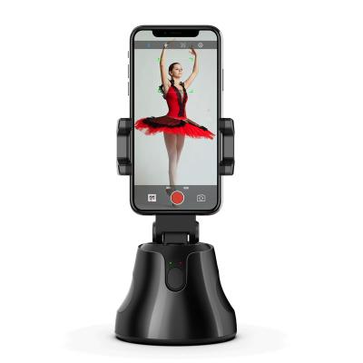 China New Adjustable Listing Face Shooting Smart Auto Tracking Controlled Shooting Camera Phone Holder for sale