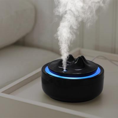 China High Quality Mountain Light Variable Colors LED Diffuser Ultrasonic Humidifier with Color Atmosphere Light for sale