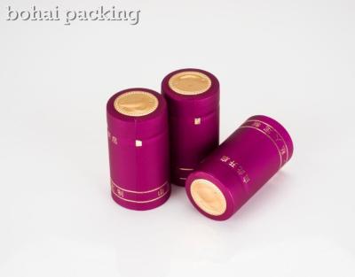 China heat sensitive golden top pvc capsule purple supplier factory manufacturer gold capsules glass bottles shrinkable film for sale