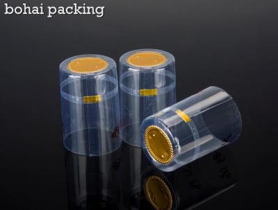 China heat sensitive clear transparent pvc capsule China supplier factory manufacturer tear line plastic caps capsules cap for sale