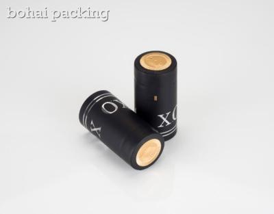 China heat sensitive black pvc capsule China supplier factory manufacturertear line emboss glass bottles shrinkable film for sale