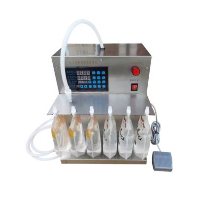 China Food CohoMachine Small Suction Spout Stand Up Pouch Juice Water Milk Machine Automatic Quantitative Filling Machine for sale