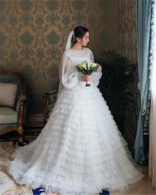 China Fashion Anti-static Puff Sleeve Princess Wedding Dresses Ivory Ruffly Tulle Long Wedding Dresses for sale