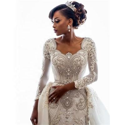 China Anti-Static Luxury Handmade Beading African Wedding Dress Long Sleeve Wedding Dress With Detachable Train for sale