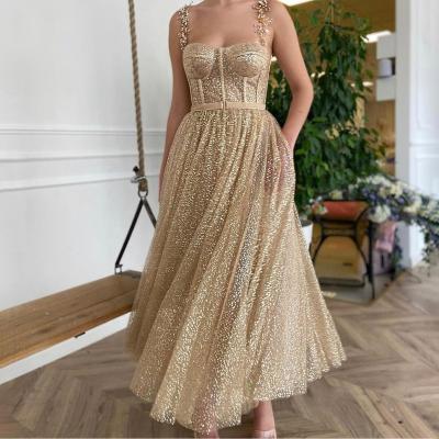 China Anti-Wrinkle Sparkle A-Line Tea-Length Party Dresses Spaghetti Strap Champagne Golden Prom Dresses With Pockets for sale