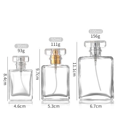 China Wholesale Cosmetic Bottles 30ml 50ml 100ml Fancy Clear Square Perfume Bottle Glass Packaging With Mist Sprayer Pump for sale