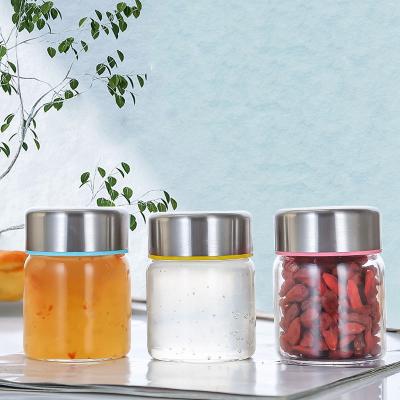 China Luxury Freshness Preservation 100ml 150ml 200ml High Borosilicate Round Glass Honey Jam Storage Jar With Stainless Steel Screw Metal Cap for sale